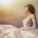 woman wearing white floral plunging neckline dress close-up photo