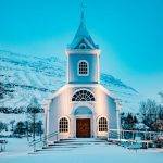 blue church during winter season